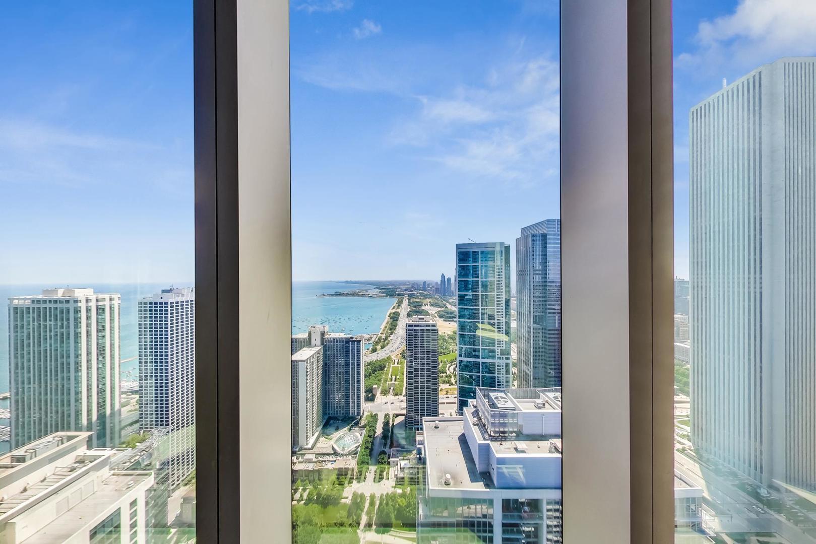 363 East Wacker Drive, Unit 2708 Chicago, IL 60601 - Photo 42 of 48 a view of a balcony with couches
