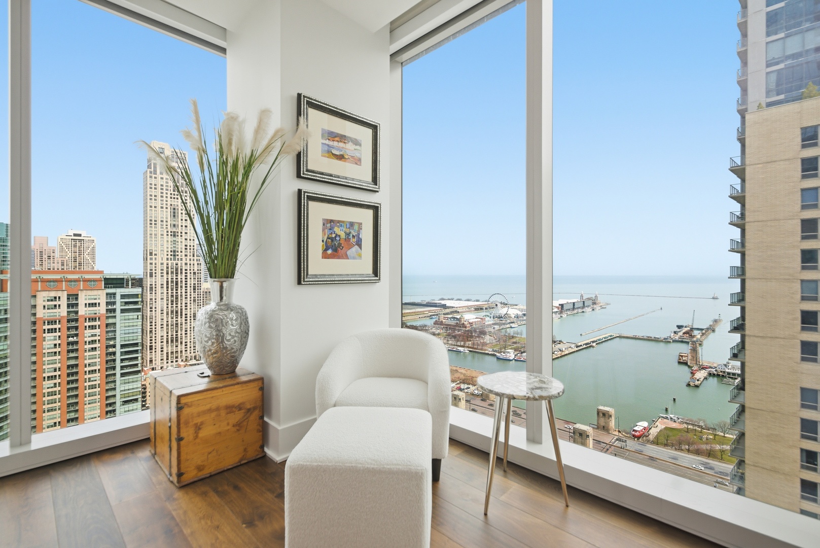 363 East Wacker Drive, Unit 2708 Chicago, IL 60601 - Photo 6 of 48 a living room with furniture and a floor to ceiling window