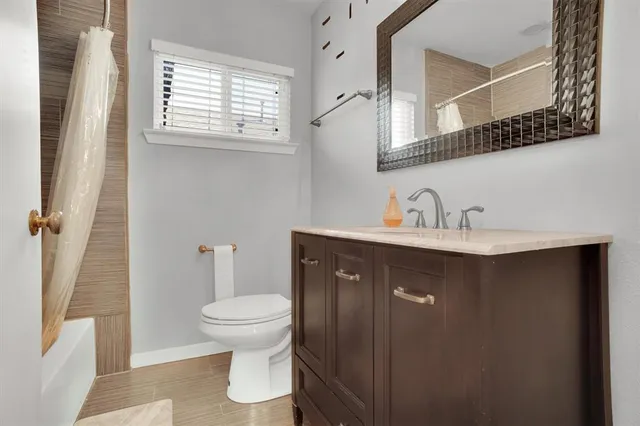 a bathroom with a sink and a toilet