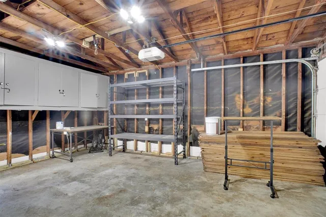 a view of a chairs and table in the room