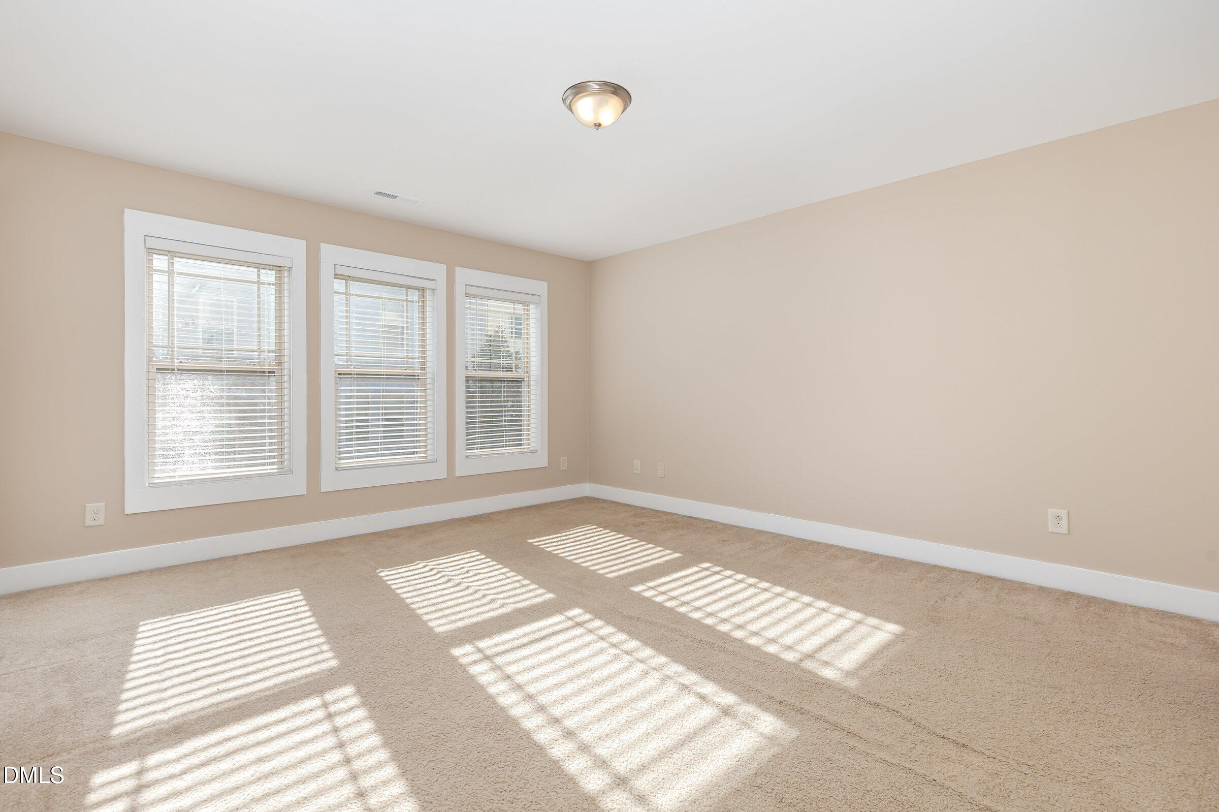3827 Glenhaven Road Raleigh, NC 27606 - Photo 18 of 32 a view of a room with windows
