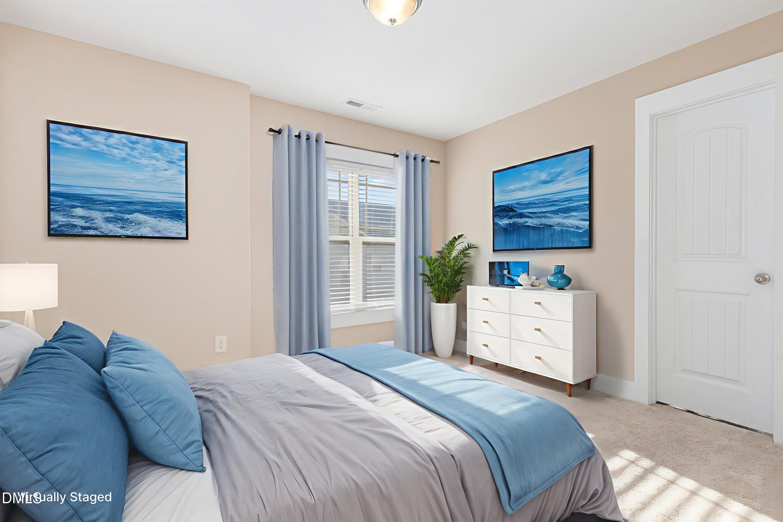 3827 Glenhaven Road Raleigh, NC 27606 - Photo 24 of 32 a bedroom with a bed dresser and a window