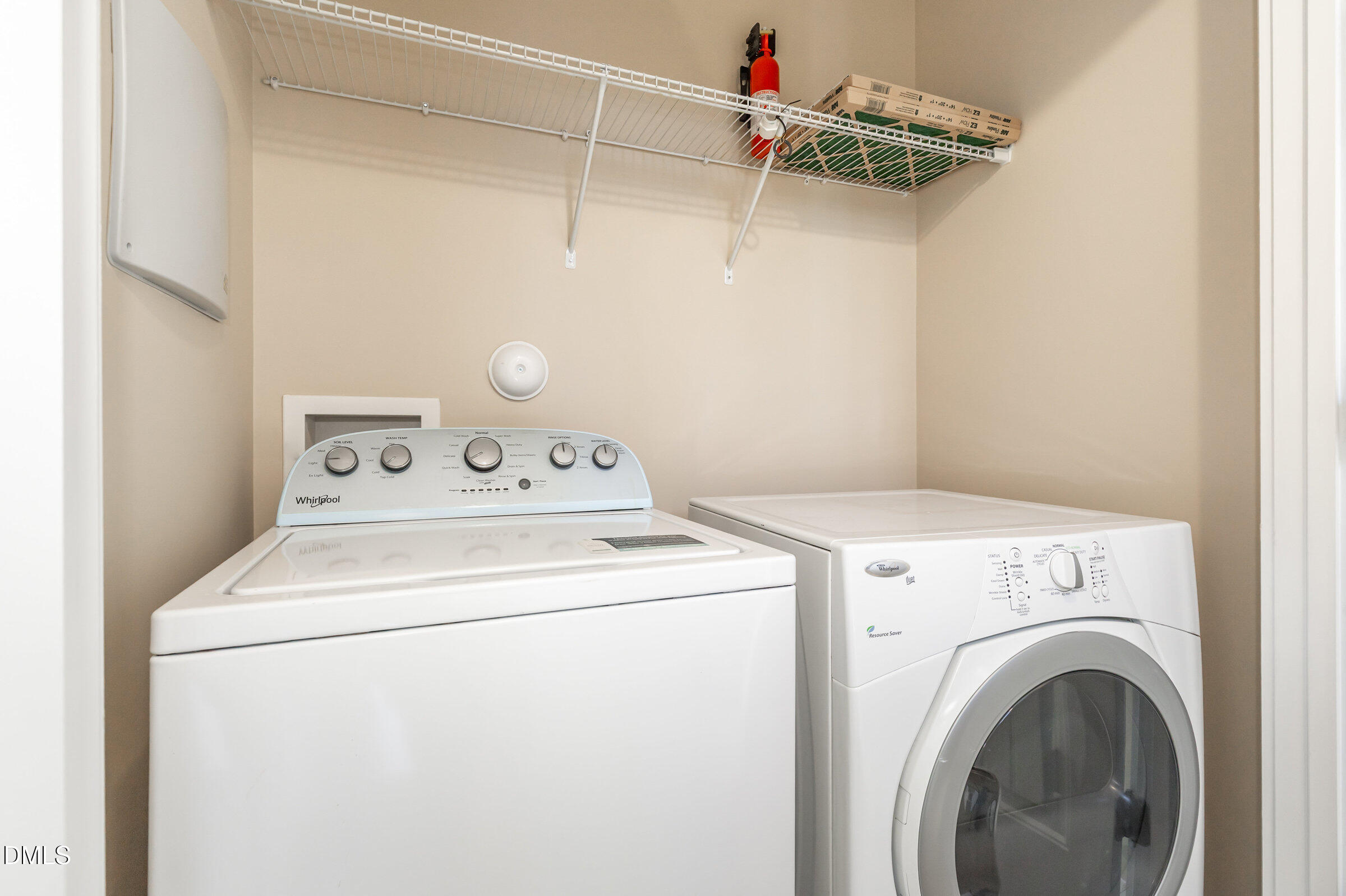 3827 Glenhaven Road Raleigh, NC 27606 - Photo 28 of 32 a utility room with dryer and washer