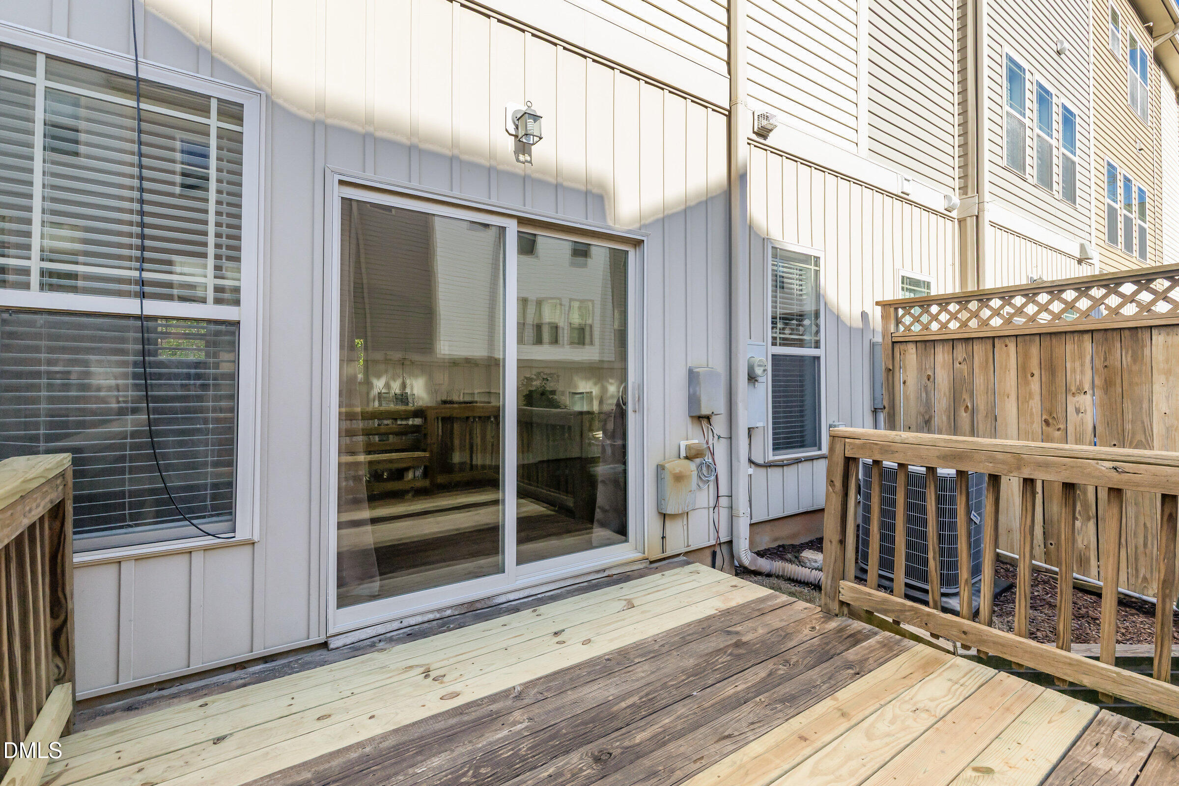 3827 Glenhaven Road Raleigh, NC 27606 - Photo 30 of 32 a view of a balcony with wooden floor