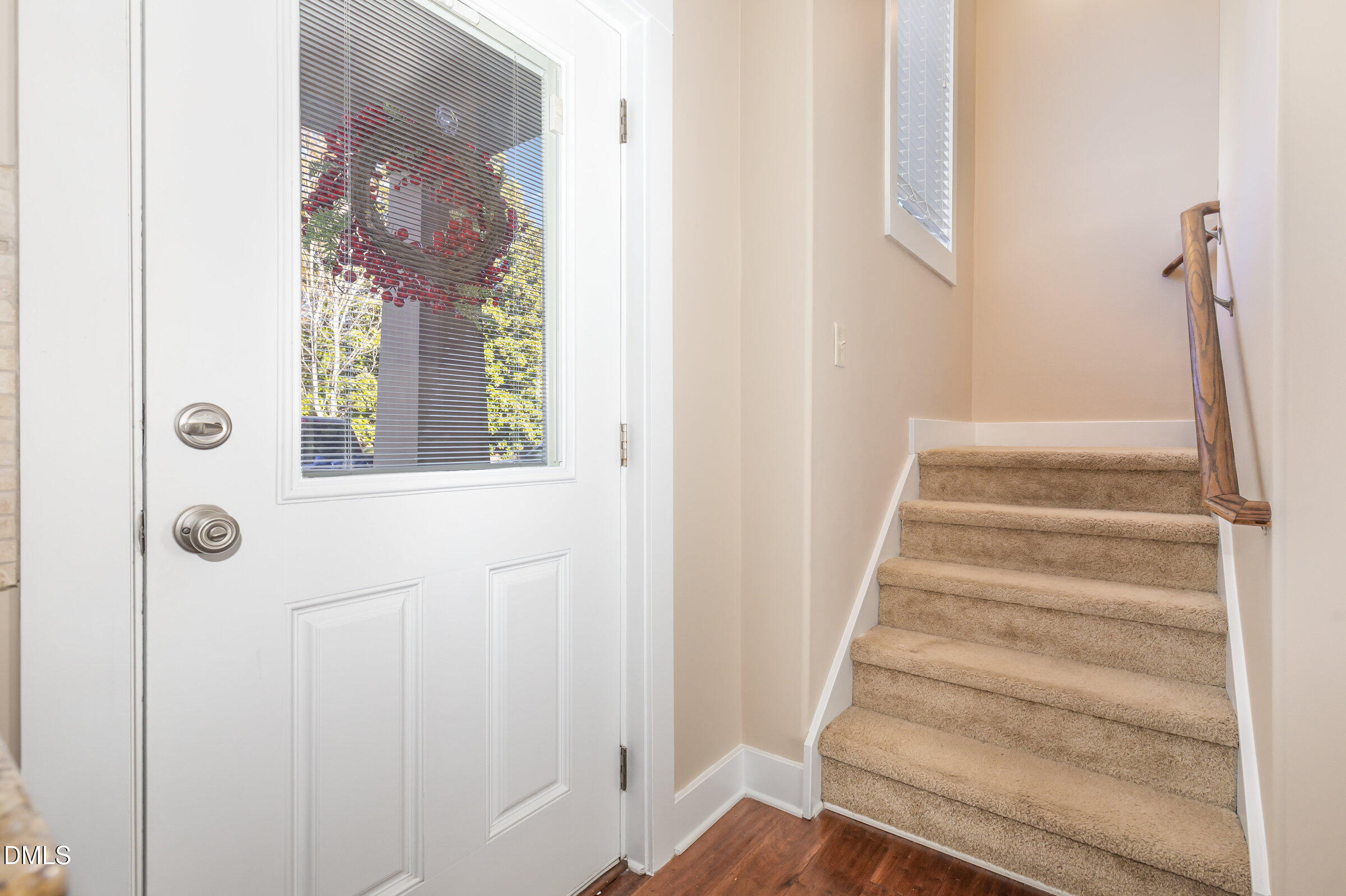 3827 Glenhaven Road Raleigh, NC 27606 - Photo 3 of 32 a view of an entryway with wooden floor