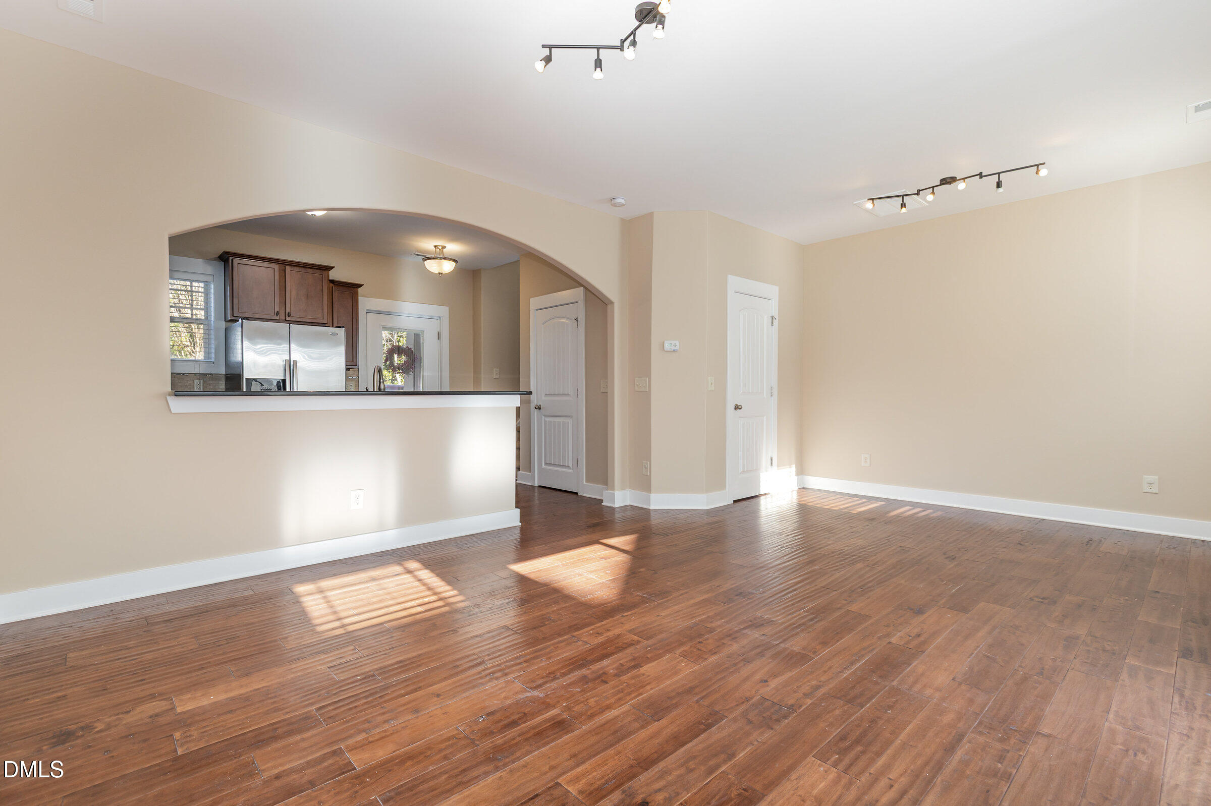3827 Glenhaven Road Raleigh, NC 27606 - Photo 7 of 32 a view of a room with wooden floor and cabinet