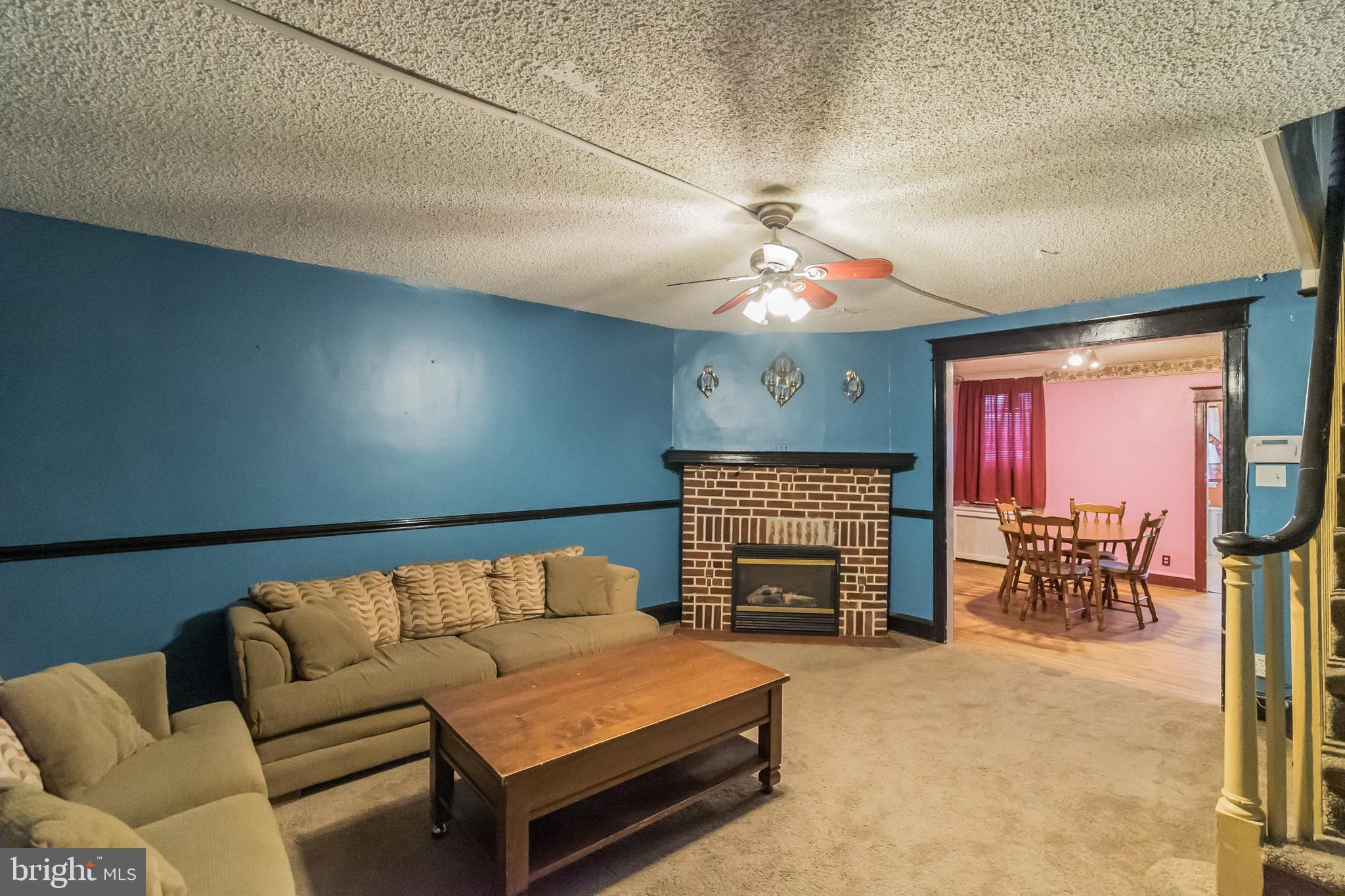 249 Copley Road Upper Darby, PA 19082 - Photo 8 of 30 Living Rm features fireplace with electric insert.