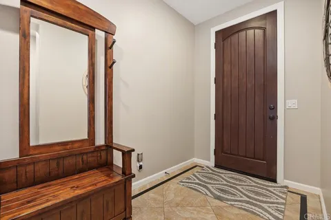a kitchen with stainless steel appliances granite countertop a stove sink and cabinets