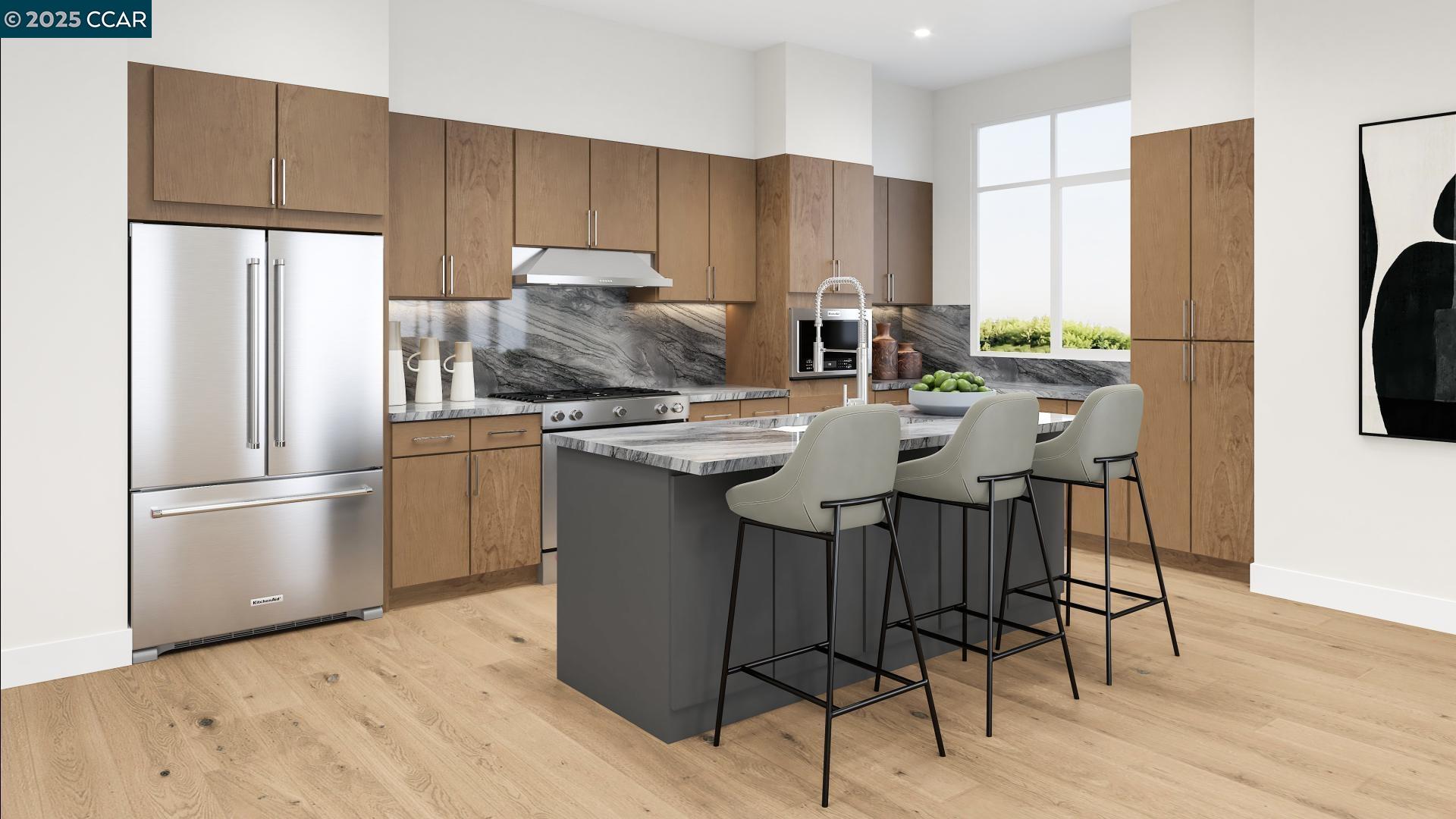 308 Torrey Pine Terrace, Unit 609 Sunnyvale, CA 94086 - Photo 2 of 19 a kitchen with stainless steel appliances a refrigerator a stove a sink cabinets and a dining table