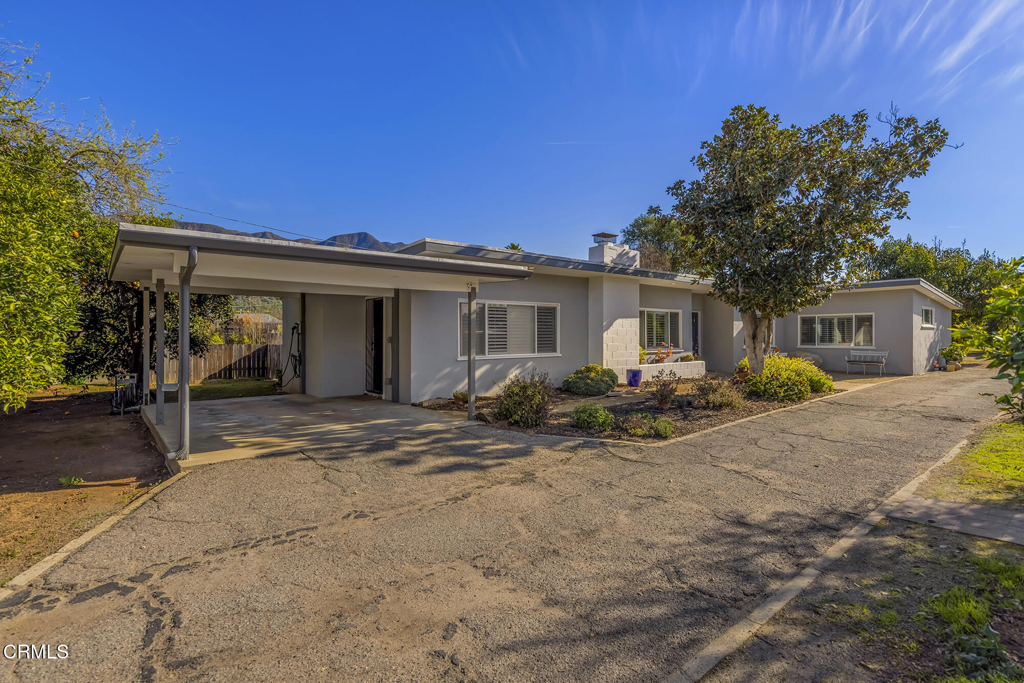 456 North Rice Road Ojai, CA 93023 - Photo 1 of 55 a view of a house with backyard sitting area and garden