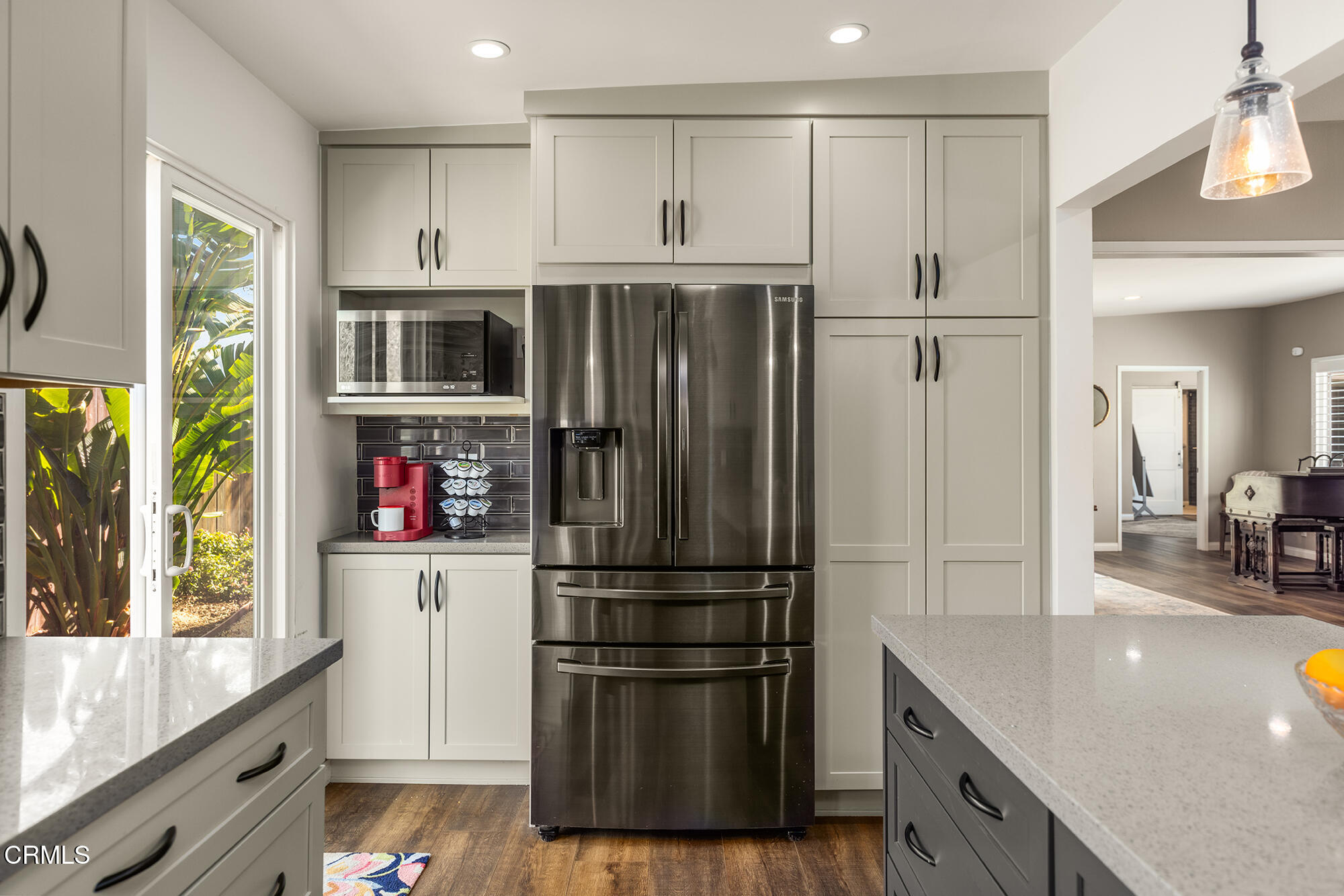 456 North Rice Road Ojai, CA 93023 - Photo 13 of 55 a kitchen with stainless steel appliances granite countertop a refrigerator and a sink