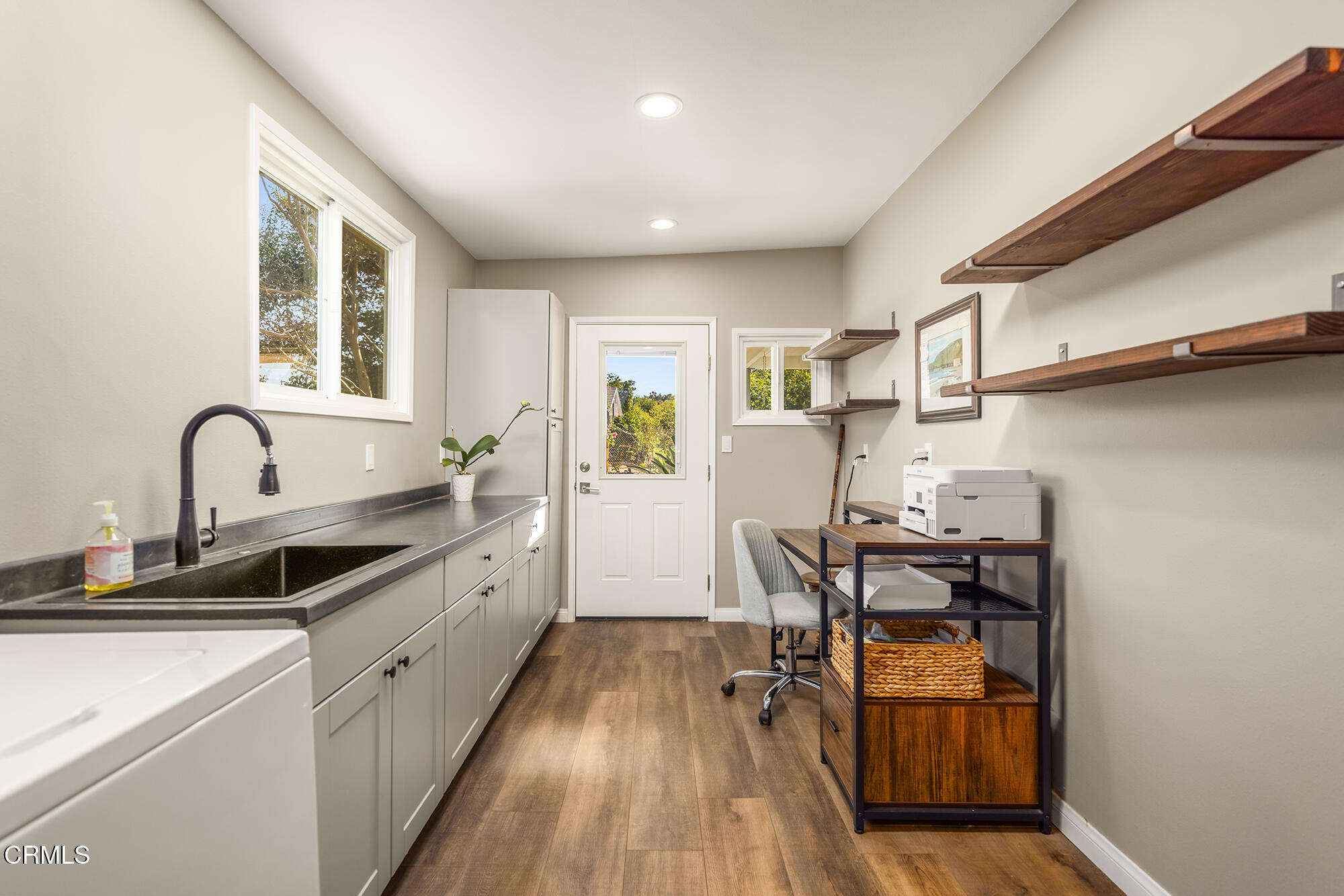 456 North Rice Road Ojai, CA 93023 - Photo 23 of 55 a kitchen with granite countertop a sink stove and refrigerator