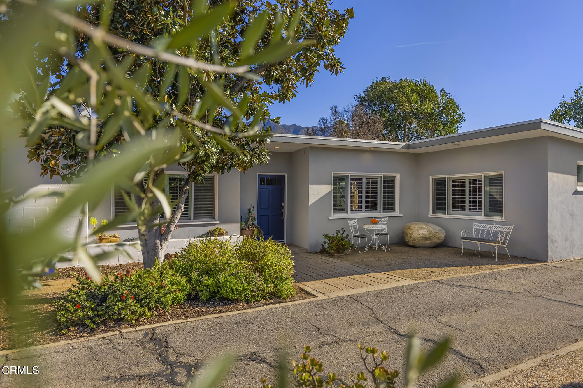 456 North Rice Road Ojai, CA 93023 - Photo 3 of 55 a front view of a house with garden