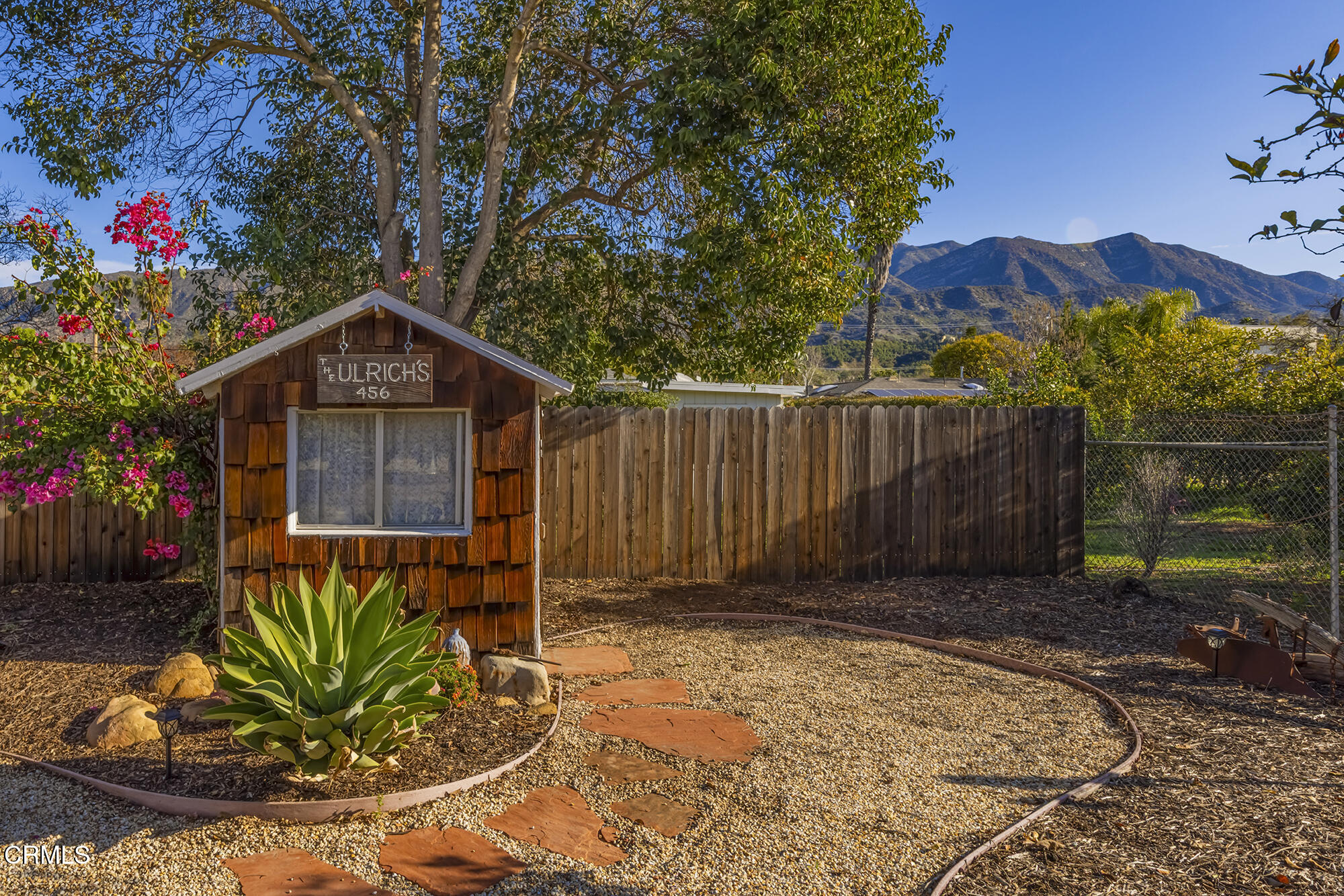 456 North Rice Road Ojai, CA 93023 - Photo 36 of 55 a front view of a house with garden