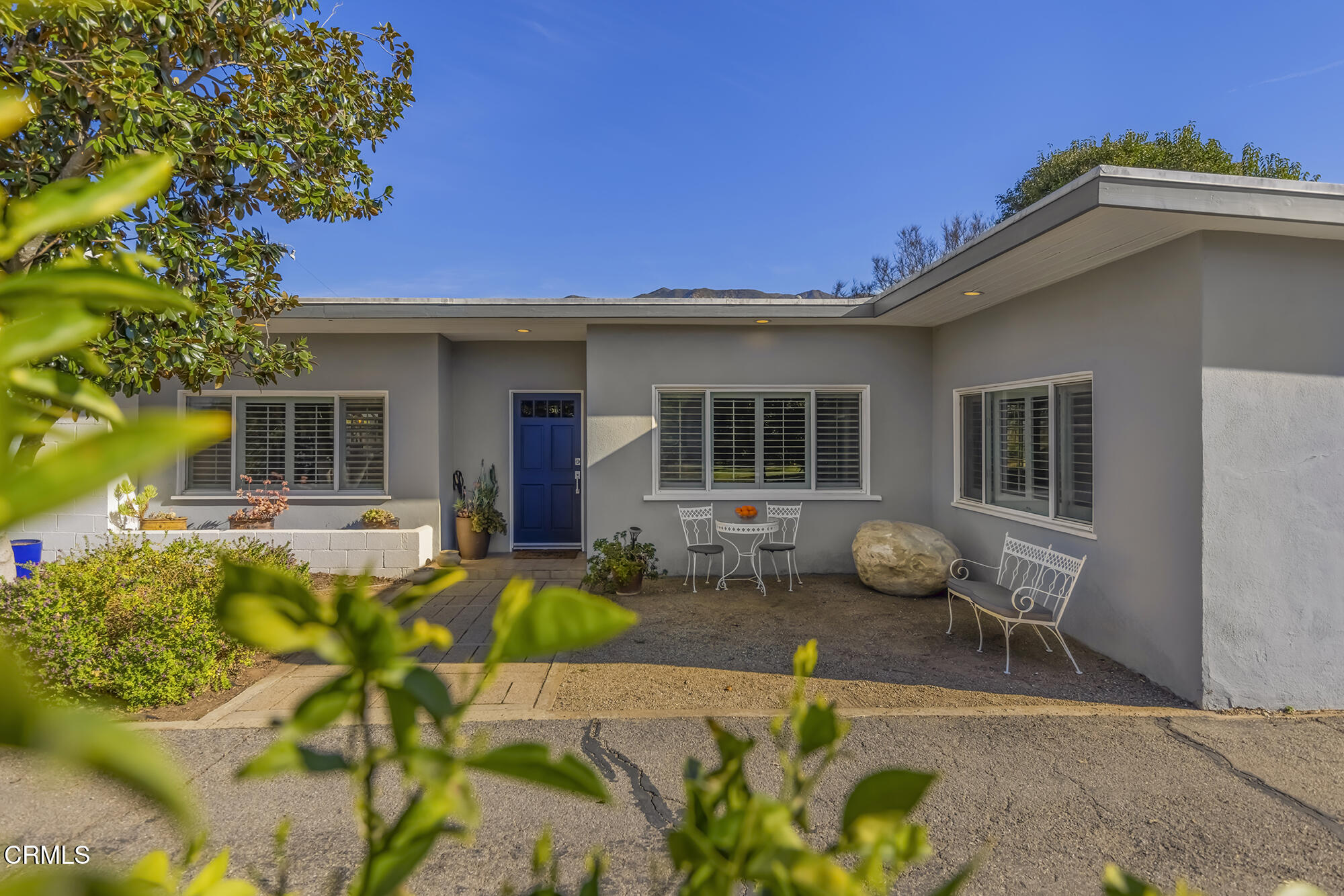 456 North Rice Road Ojai, CA 93023 - Photo 4 of 55 a front view of a house with patio