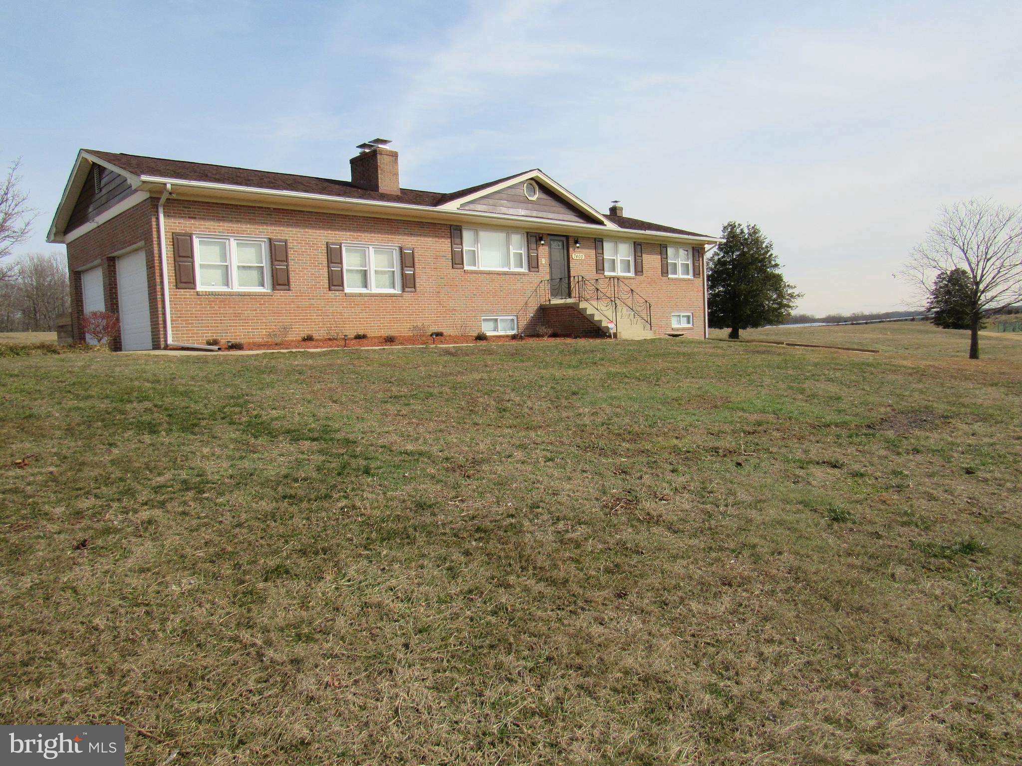 Beautiful home w/ paved drive + side entry garage