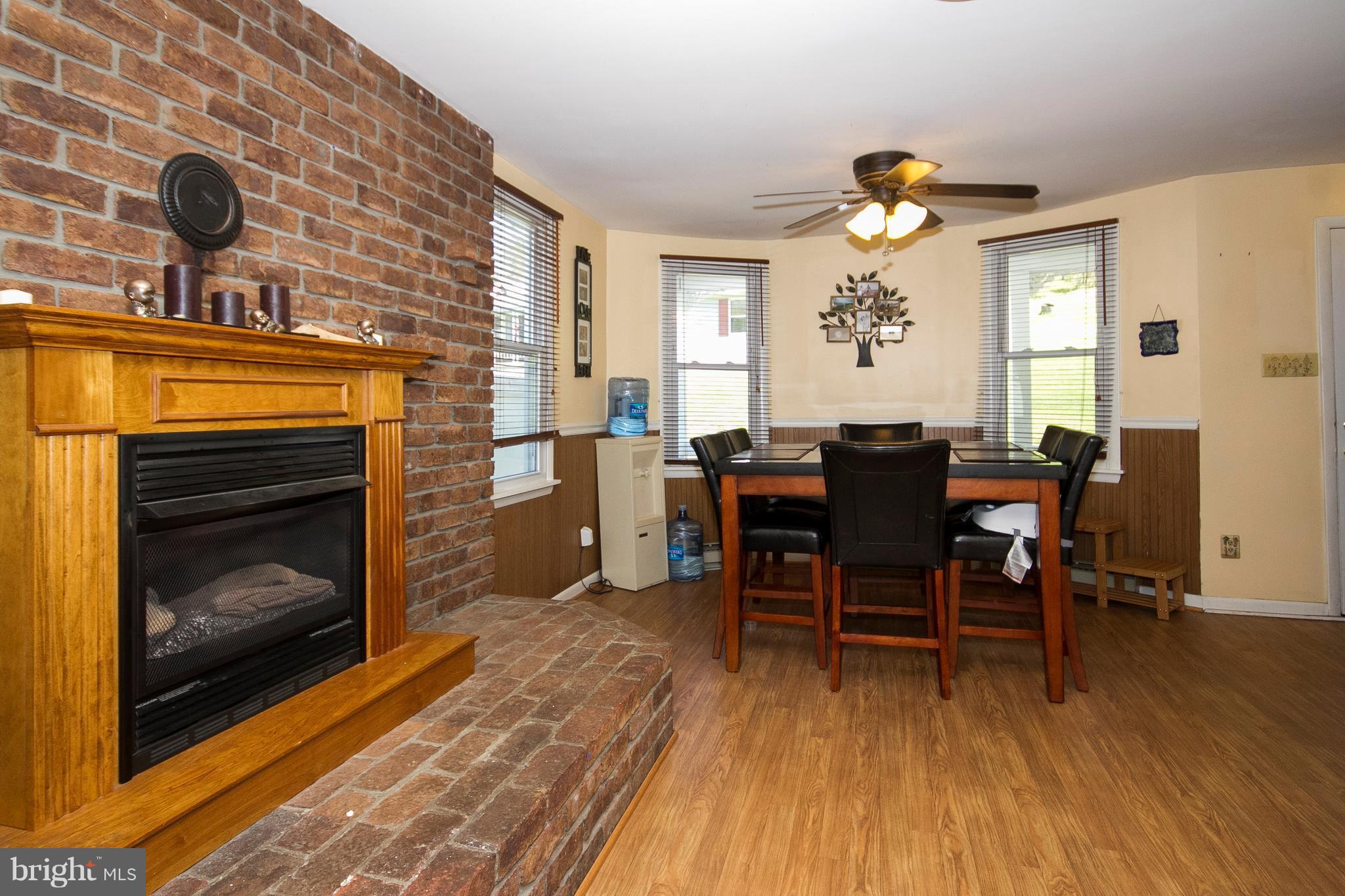 2847 Patapsco Road Finksburg, MD 21048 - Photo 8 of 30 a view of a livingroom with furniture and a fireplace