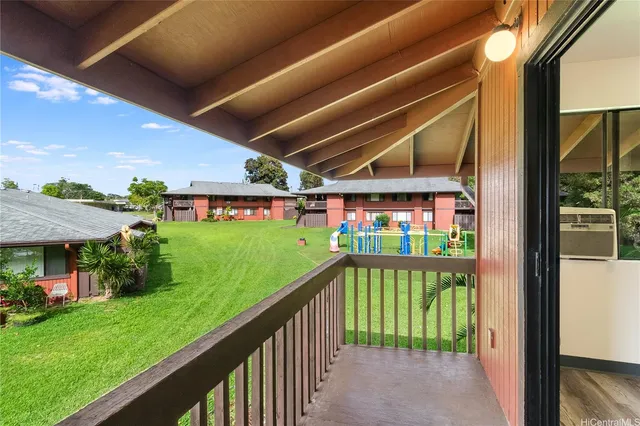 a view of a porch with a backyard
