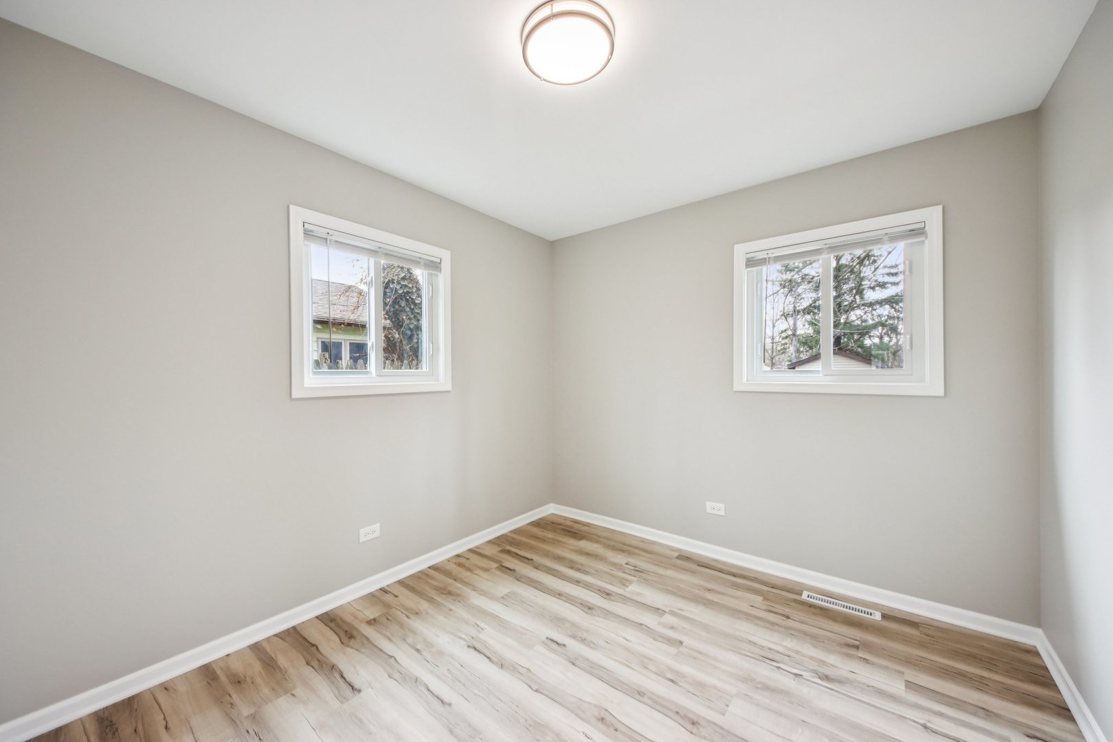 65 Della Street Crystal Lake, IL 60014 - Photo 20 of 28 a view of empty room with wooden floor
