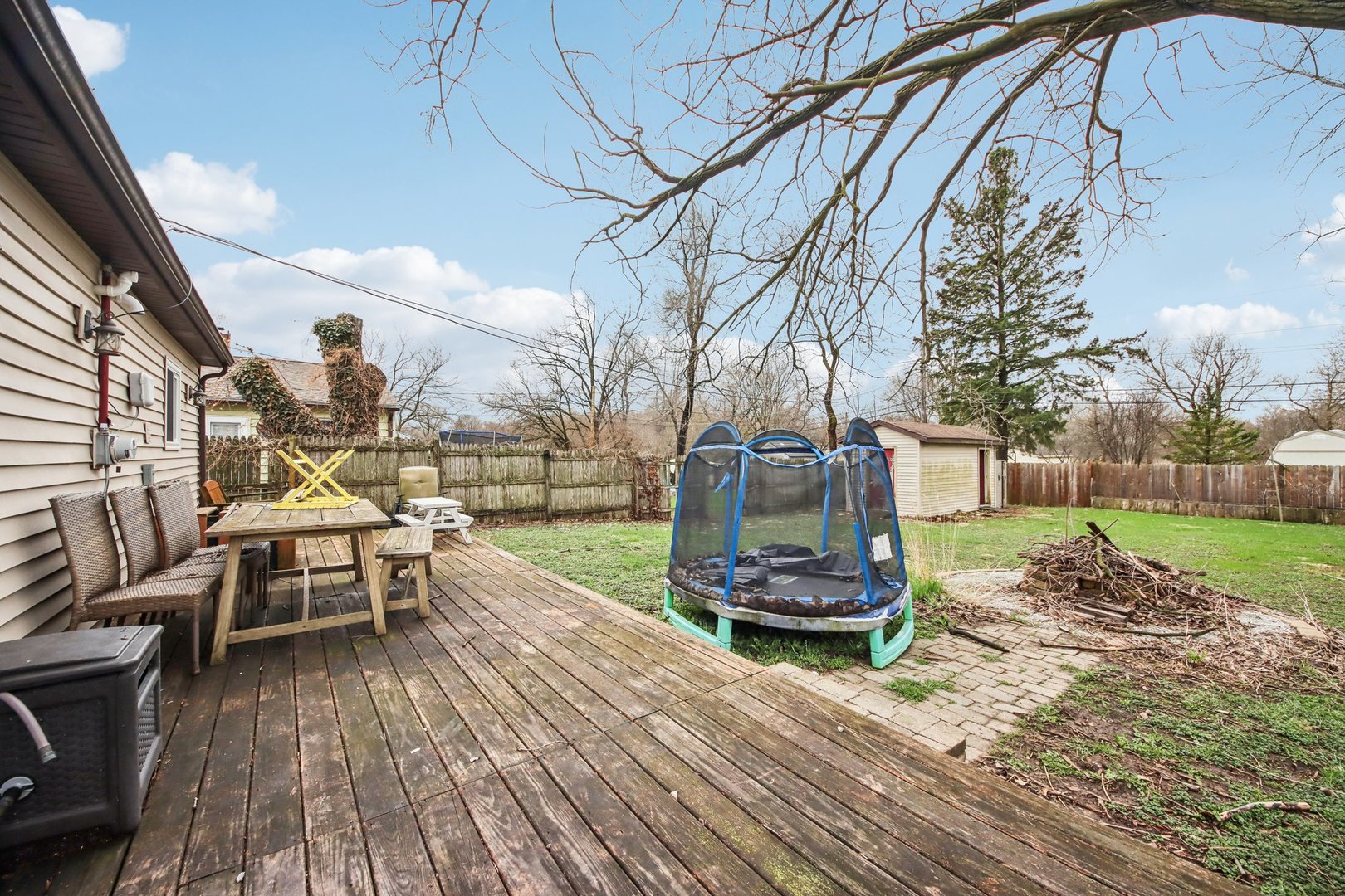 65 Della Street Crystal Lake, IL 60014 - Photo 25 of 28 a view of a house with backyard and sitting area