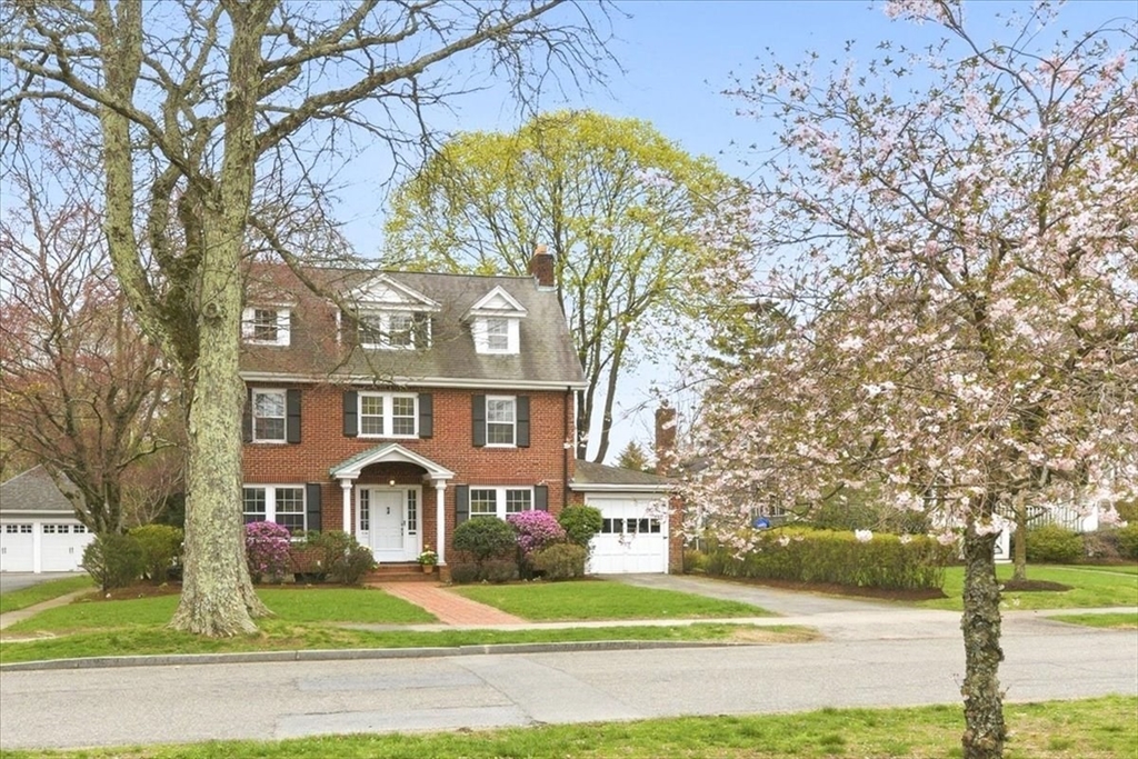 238 Harris Avenue Needham, MA 02492 - Photo 1 of 35 a front view of residential houses with yard and trees