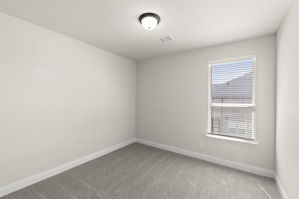 3900 Keya Drive Prosper, TX 75078 - Photo 24 of 36 an empty room with a window