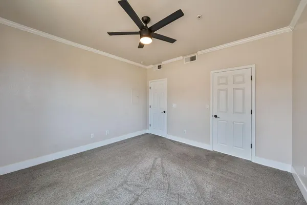 a view of an empty walk in closet