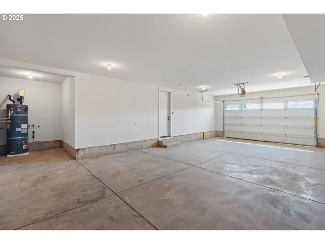 a view of an house with backyard space and balcony