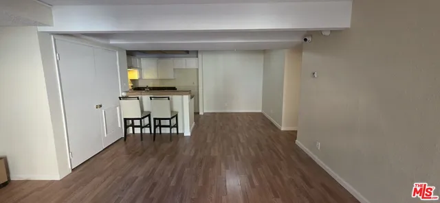 a view of a kitchen from the hallway