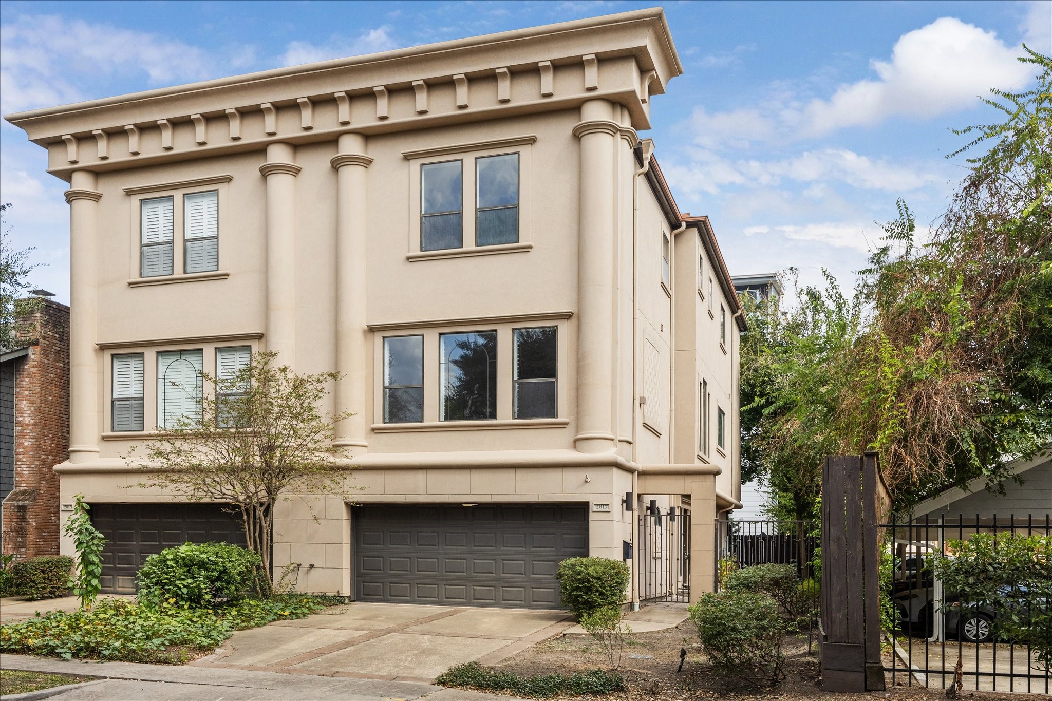 2817 Newman Street Houston, TX 77098 - Photo 1 of 36 a front view of a house with plants