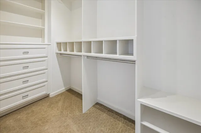 a view of an empty walk in closet