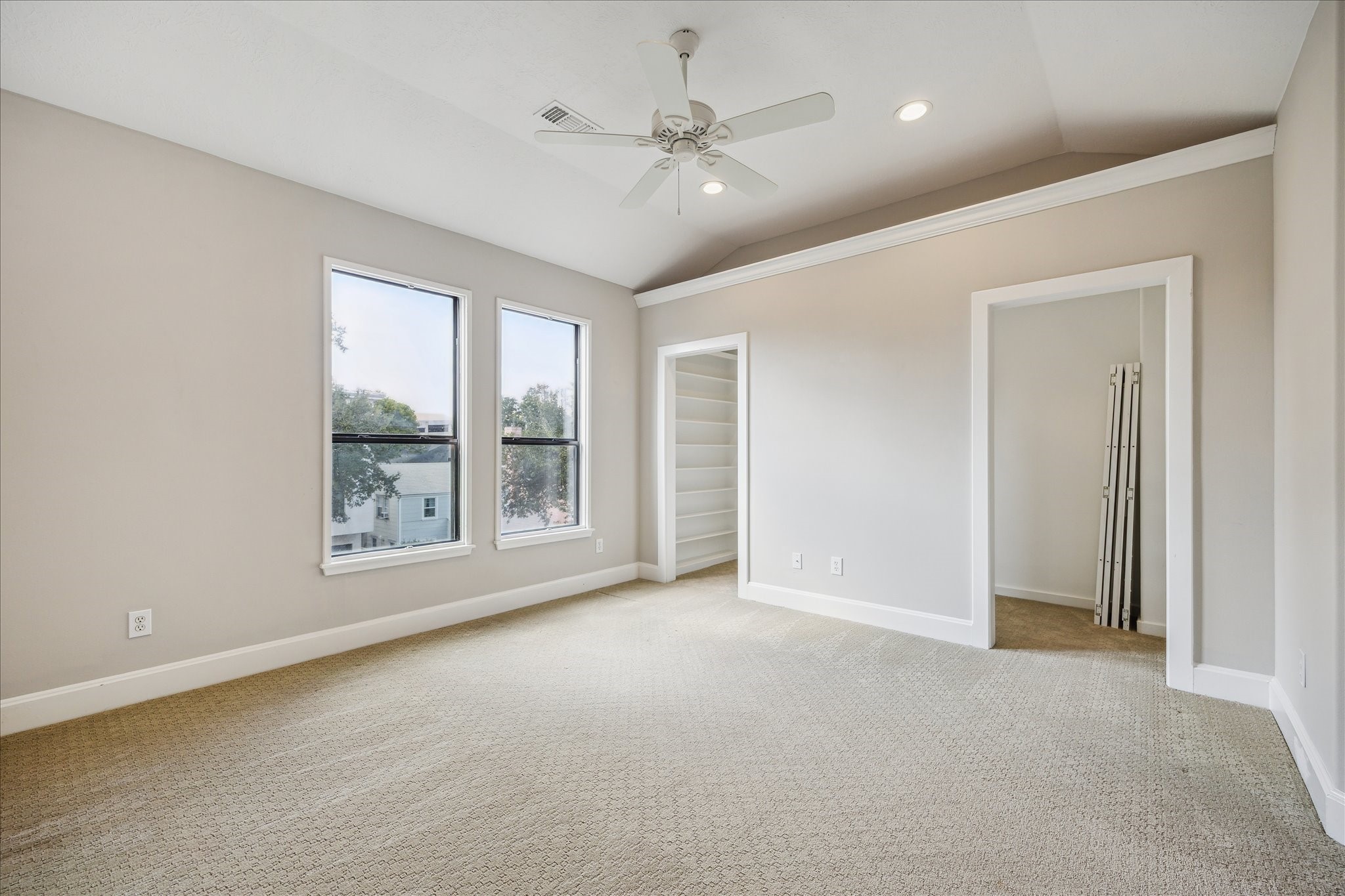 2817 Newman Street Houston, TX 77098 - Photo 28 of 36 an empty room with windows and fan