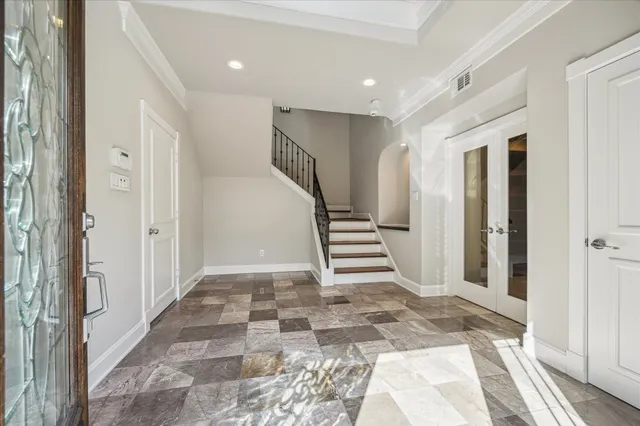 a view of entryway with stairs