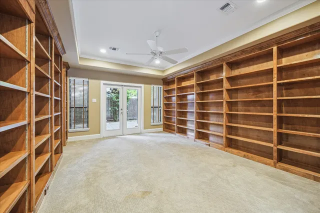 a view of an empty room with a empty shelves