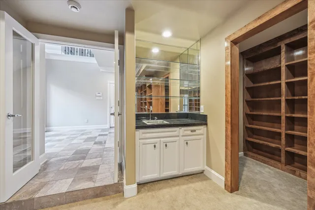 a view of kitchen with stainless steel appliances cabinets and a counter top space