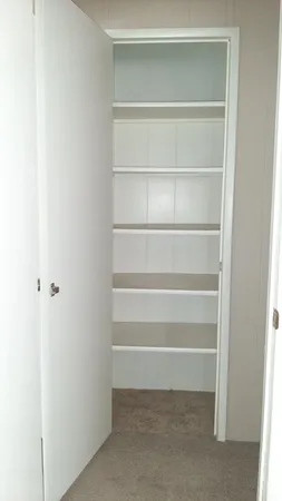 a view of a room with a staircase