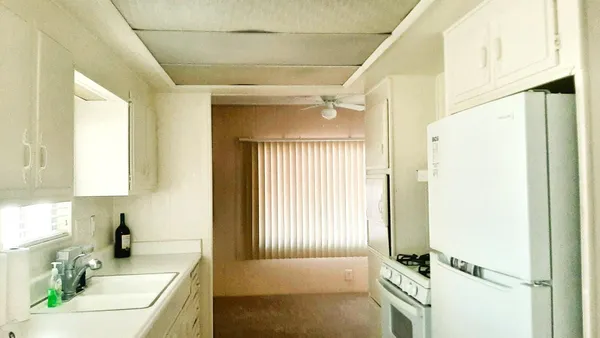 a view of an empty walk in closet