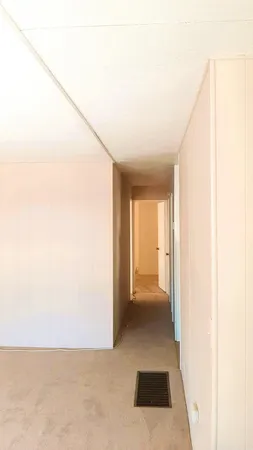 an empty room with window