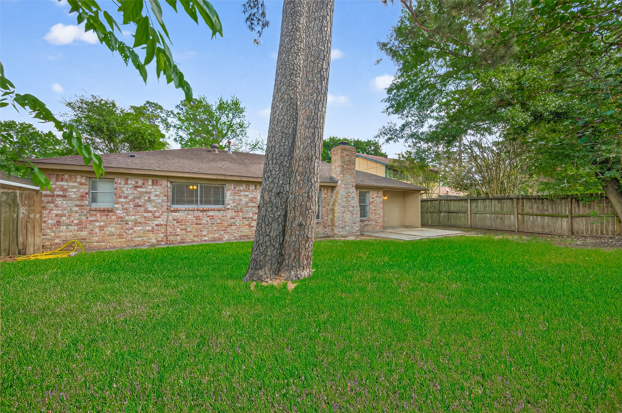 23919 Farm Hill Drive Spring, TX 77373 - Photo 41 of 41 a view of a house with a backyard