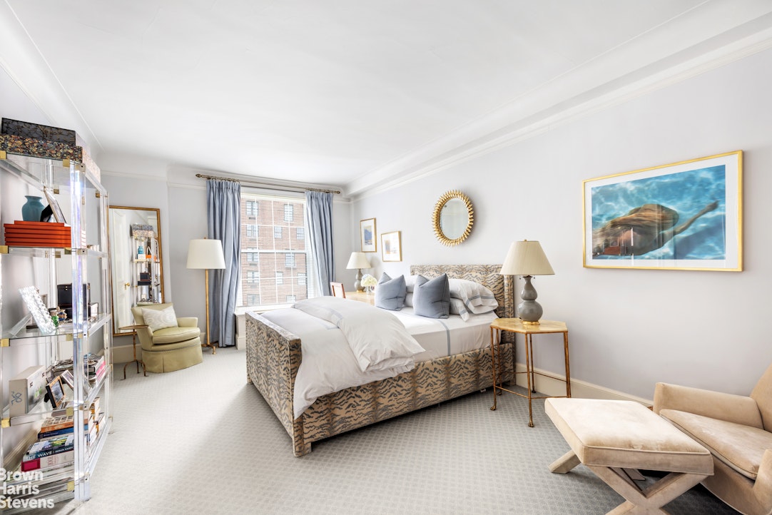 765 Park Avenue, Unit 6/7C Manhattan, NY 10021 - Photo 14 of 21 a bedroom with bed and window