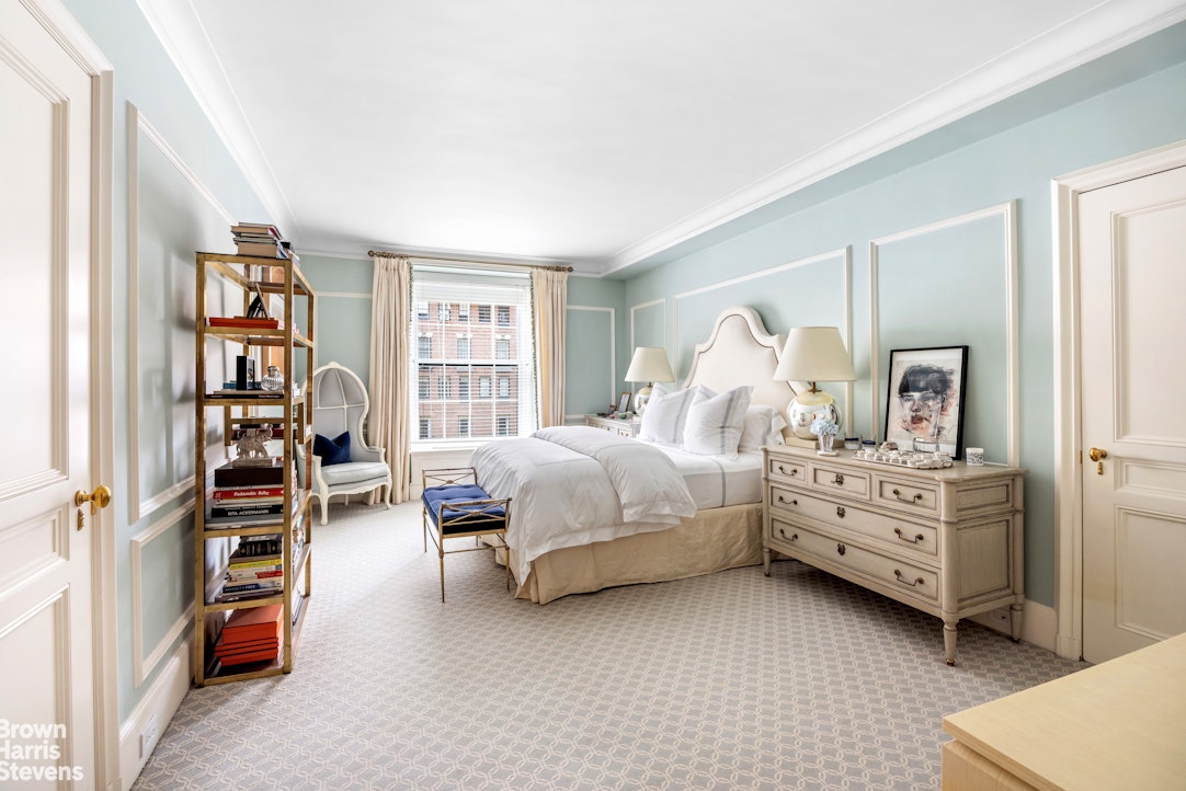 765 Park Avenue, Unit 6/7C Manhattan, NY 10021 - Photo 16 of 21 a bedroom with a bed and a window