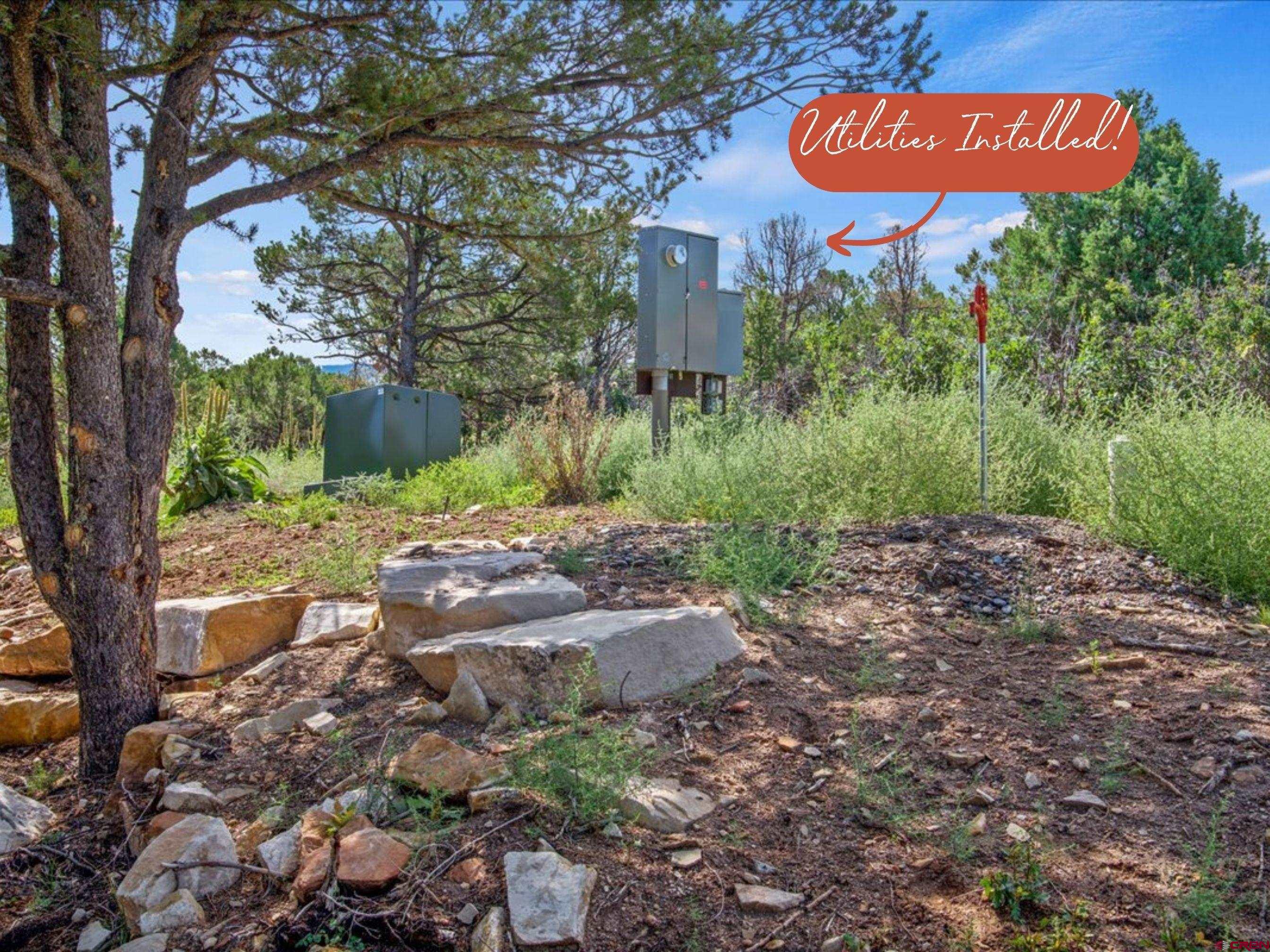 23 Pine Drive Ridgway, CO 81432 - Photo 13 of 26 a sign that is on the side of the road