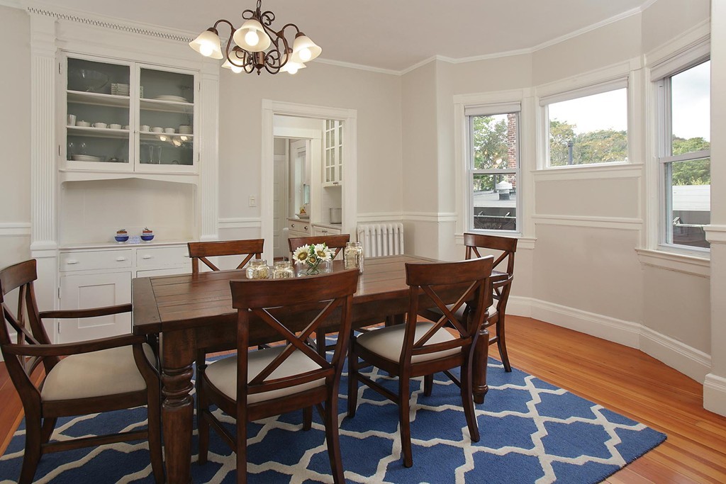 20 Winchester Street, Unit 8 Brookline, MA 02446 - Photo 3 of 8 a dining room with furniture and window