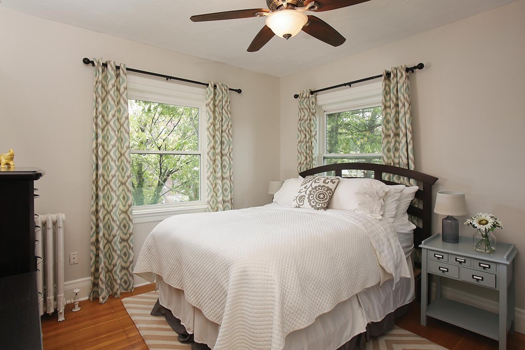 20 Winchester Street, Unit 8 Brookline, MA 02446 - Photo 5 of 8 a bedroom with a bed and a window