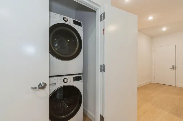 a view of a building with sitting area