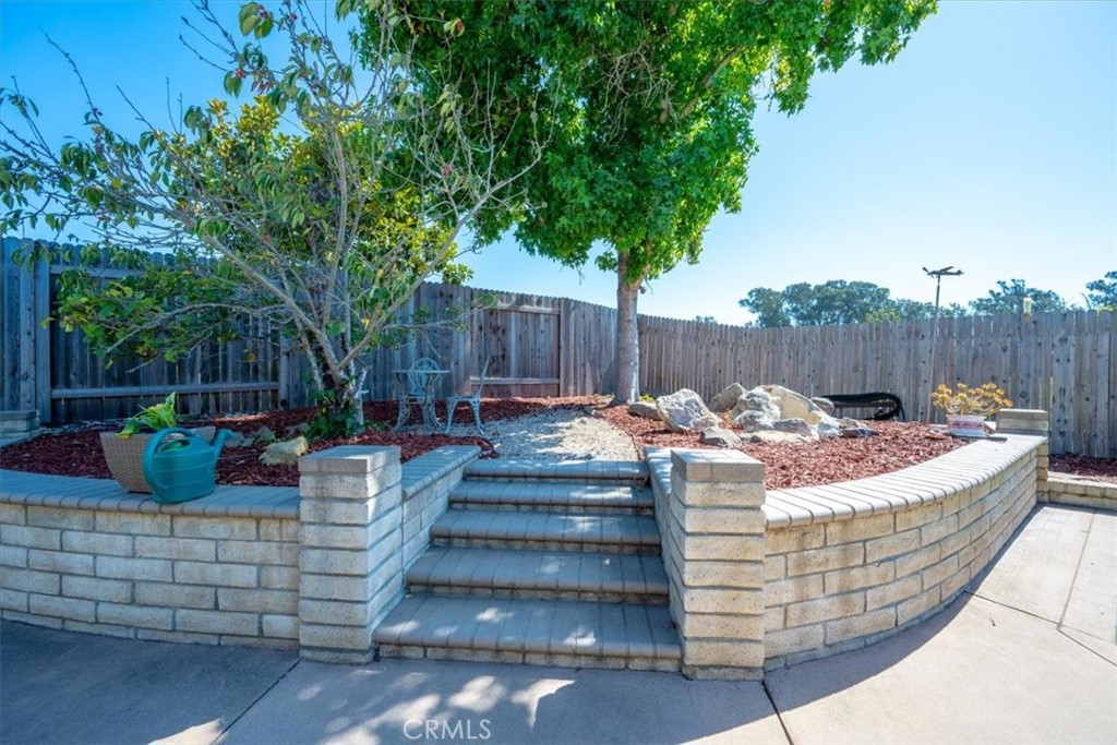 634 Hartnell Road Santa Maria, CA 93455 - Photo 24 of 31 RAISED PLANTER AREA WITH WATERFALL