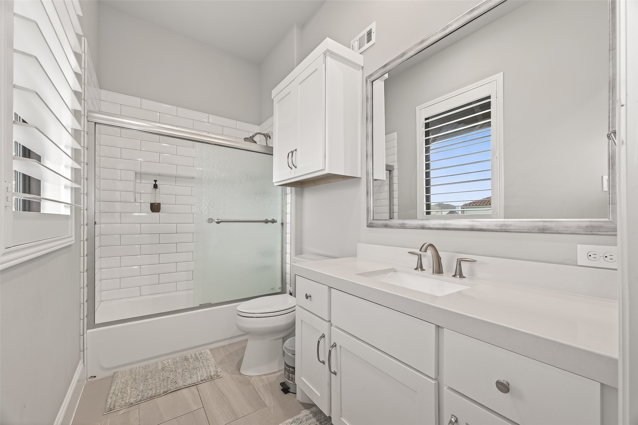 2435 Prairie Hollow Lane Houston, TX 77077 - Photo 33 of 50 a bathroom with a sink toilet and shower