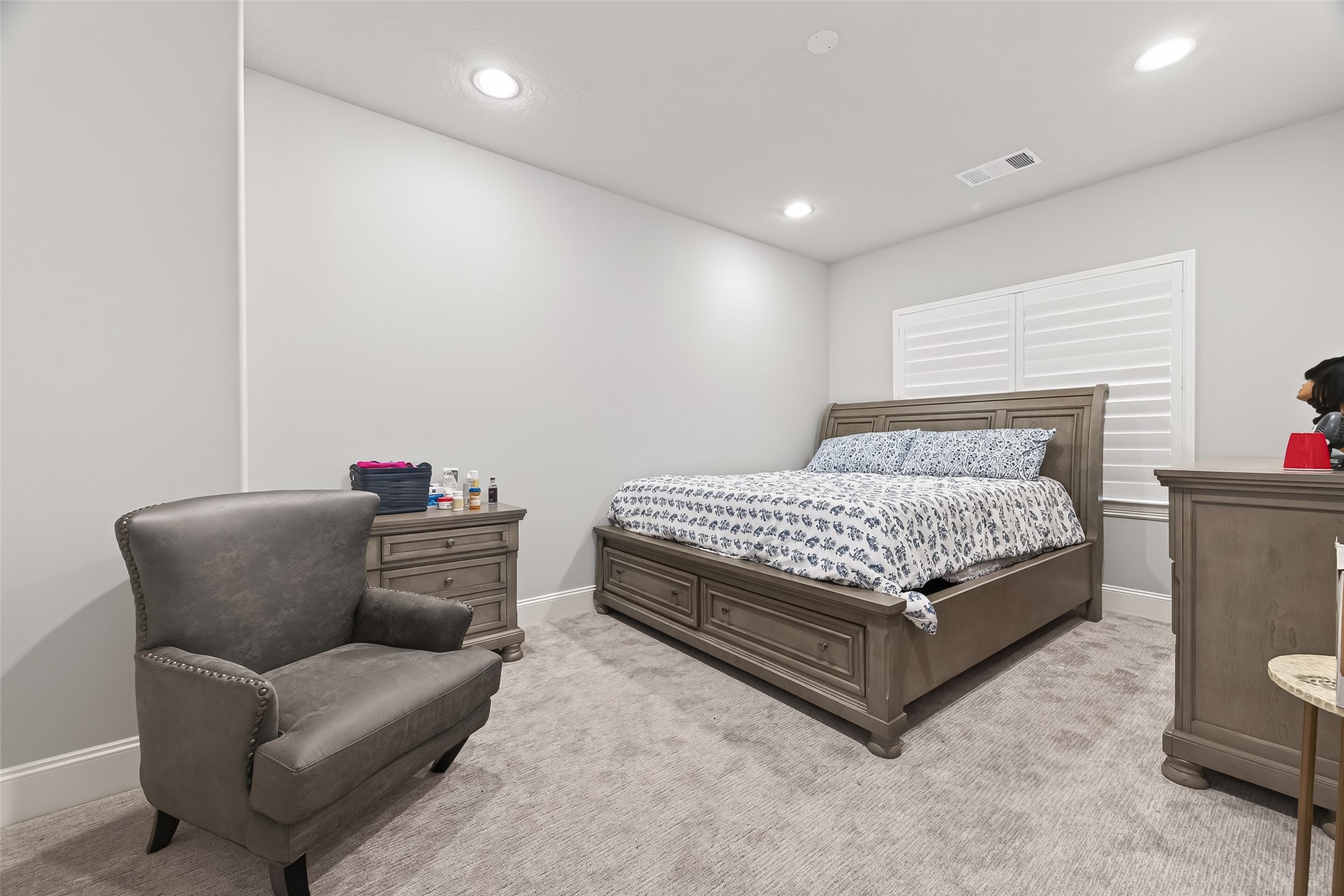 2435 Prairie Hollow Lane Houston, TX 77077 - Photo 36 of 50 a bedroom with furniture and a couch