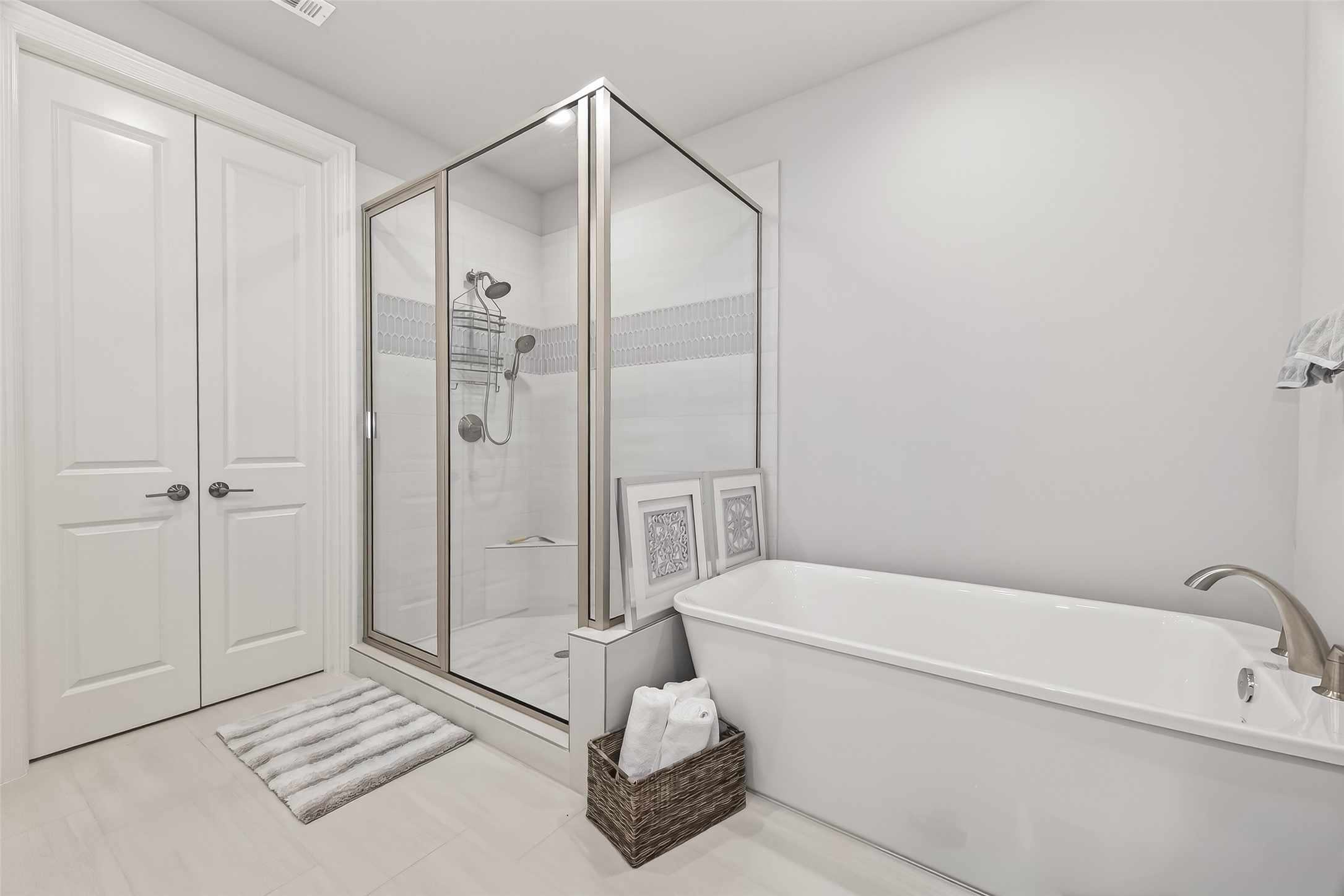 2435 Prairie Hollow Lane Houston, TX 77077 - Photo 38 of 50 a bathroom with a tub and shower