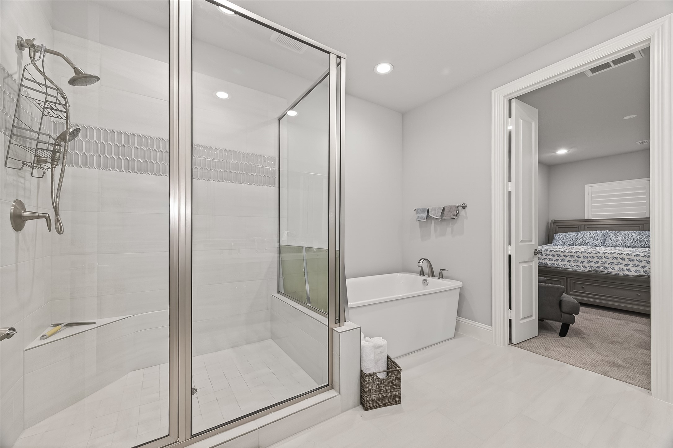 2435 Prairie Hollow Lane Houston, TX 77077 - Photo 39 of 50 a bathroom with a tub and shower